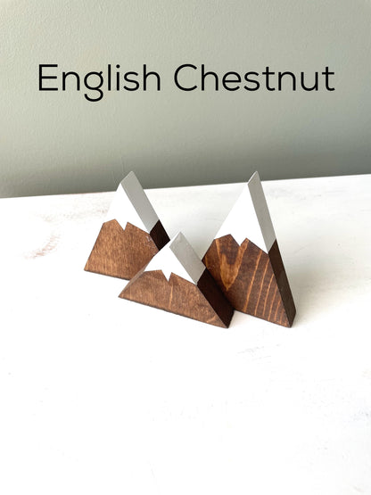 Close-up of the mountain decor with meticulously painted snow caps english chestnut stain